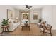 Bright living room with neutral decor, stylish furnishings, and sliding glass doors to the outdoor space at 35314 N 31St Ave, Phoenix, AZ 85086