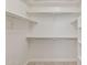 Spacious walk-in closet with built-in shelving and ample storage space at 35314 N 31St Ave, Phoenix, AZ 85086