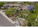 Residential home boasts a solar panel system, nicely situated in a well-maintained neighborhood with lush landscaping at 3818 E Quail Ave, Phoenix, AZ 85050