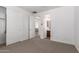 Bedroom with an open doorway to a bathroom at 3818 E Quail Ave, Phoenix, AZ 85050