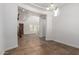 Bright entryway featuring tile flooring, open floor plan, modern lighting, and staircase at 3818 E Quail Ave, Phoenix, AZ 85050