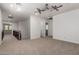 Hallway with carpeted floors and many doors at 3818 E Quail Ave, Phoenix, AZ 85050