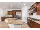 Modern kitchen featuring granite counters, stainless steel appliances, and ample cabinet space at 3818 E Quail Ave, Phoenix, AZ 85050