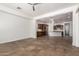 Open living area with tile floors and seamless transition to a well-equipped kitchen at 3818 E Quail Ave, Phoenix, AZ 85050