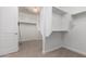 Walk-in closet with built in shelves and clothes rods for organization at 3818 E Quail Ave, Phoenix, AZ 85050