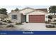 Beautiful single-story home with stone accents and a two-car garage in a well-kept neighborhood at 4416 S 127Th Ave, Avondale, AZ 85323