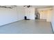 Spacious garage with epoxy flooring, ample storage, and a clean, organized layout at 4617 E Emile Zola Ave, Phoenix, AZ 85032