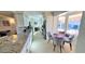 Bright kitchen with stainless steel appliances and an eat-in dining space with light tile floor at 4617 E Emile Zola Ave, Phoenix, AZ 85032