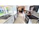 Bright kitchen with granite counters, stainless appliances, and an open layout connecting to the living area at 4617 E Emile Zola Ave, Phoenix, AZ 85032