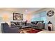 Comfortable living room featuring contemporary decor, stylish furniture, and plenty of natural light at 4617 E Emile Zola Ave, Phoenix, AZ 85032