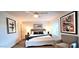 Stylish bedroom with a large bed, seating area, and natural light at 4617 E Emile Zola Ave, Phoenix, AZ 85032