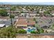 Wonderful aerial shot of a home and its backyard, highlighting a pool and lush greenery at 5332 N 81St Pl, Scottsdale, AZ 85250