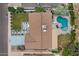 Stunning aerial view showcasing the home's backyard oasis with pool and mature landscaping at 5332 N 81St Pl, Scottsdale, AZ 85250