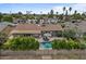 Charming backyard with a sparkling pool, lush landscaping, and patio area perfect for entertaining at 5332 N 81St Pl, Scottsdale, AZ 85250
