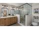 Nicely appointed bathroom featuring a glass-enclosed shower and a dual-sink vanity at 5332 N 81St Pl, Scottsdale, AZ 85250