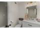 Cozy bathroom with modern fixtures, white vanity, and a well-lit mirror, creating a serene space at 5332 N 81St Pl, Scottsdale, AZ 85250