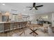 Open-concept living space with a kitchen island, dining area, and comfortable seating at 5332 N 81St Pl, Scottsdale, AZ 85250