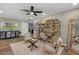 Cozy living room with stylish decor, wood floors, and comfortable seating at 5332 N 81St Pl, Scottsdale, AZ 85250