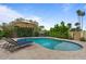 Inviting backyard pool with lounge chairs and lush landscaping, perfect for relaxing at 5332 N 81St Pl, Scottsdale, AZ 85250