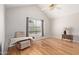Bright bedroom includes vaulted ceiling, hardwood floors, and a large window providing natural light at 5704 E Aire Libre Ave # 1093, Scottsdale, AZ 85254