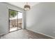 Light-filled dining area with sliding door access to a private outdoor space at 5704 E Aire Libre Ave # 1093, Scottsdale, AZ 85254