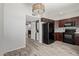 Spacious kitchen with stainless steel appliances, modern cabinets, and a view of living space at 5704 E Aire Libre Ave # 1093, Scottsdale, AZ 85254