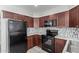 Updated kitchen boasts modern appliances, sleek countertops, and ample cabinet space at 5704 E Aire Libre Ave # 1093, Scottsdale, AZ 85254