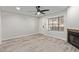 Inviting living room showcases stylish floors, a cozy fireplace, and ample natural light at 5704 E Aire Libre Ave # 1093, Scottsdale, AZ 85254