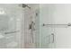Beautiful shower design offers modern fixtures, sleek tiling, and convenient accessibility options with safety bars at 5704 E Aire Libre Ave # 1093, Scottsdale, AZ 85254