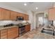 Well-equipped kitchen featuring granite countertops and stainless steel appliances at 6418 S Pinaleno Pl, Chandler, AZ 85249