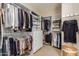 Organized walk-in closet with ample storage space, shelving, and hanging racks at 6418 S Pinaleno Pl, Chandler, AZ 85249