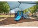 Blue and green community playground equipment with slide and climbing structures at 7718 W Pipestone Pl, Phoenix, AZ 85035