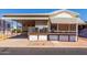 Welcoming single-story home with covered parking, and well-kept landscaping at 7750 E Broadway Rd # 357, Mesa, AZ 85208