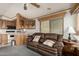 A comfy living room featuring modern appliances, comfortable seating, and a combined kitchen area at 7750 E Broadway Rd # 357, Mesa, AZ 85208