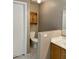 Bright bathroom with a toilet and cabinet at 8759 W Port Au Prince Ln, Peoria, AZ 85381