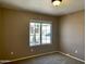 Cozy bedroom with window for natural light at 8759 W Port Au Prince Ln, Peoria, AZ 85381