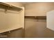Walk-in closet with shelving for maximum storage and organization at 8759 W Port Au Prince Ln, Peoria, AZ 85381