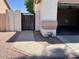Paved access to the attached garage with secure gate access at 8759 W Port Au Prince Ln, Peoria, AZ 85381