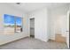 Bright bedroom with carpet floors, closet, ceiling fan, and natural light creates a calming atmosphere at 11227 E Crescent Ave, Mesa, AZ 85208