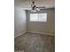 This is a bedroom that has a ceiling fan and light gray walls at 11849 N 29Th Ave, Phoenix, AZ 85029