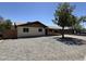 This single-story house features low-maintenance landscaping at 11849 N 29Th Ave, Phoenix, AZ 85029