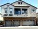 Stylish three-story home with stone accents and three-car garage at 1350 S Greenfield Rd # 2231, Mesa, AZ 85206