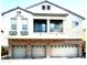 Charming two-story home featuring a three-car garage and a private second story balcony at 1350 S Greenfield Rd # 2231, Mesa, AZ 85206