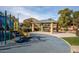 Community playground with picnic benches and lush landscaping for Gathering enjoyment at 1350 S Greenfield Rd # 2231, Mesa, AZ 85206