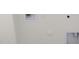 Wall with power outlets, plumbing hookups and a covered smoke detector at 1375 S 239Th Dr, Buckeye, AZ 85326