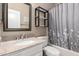 The bathroom includes a granite countertop with a shower and tub combo at 14314 W Lexington Ave, Goodyear, AZ 85395