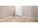 This bedroom shows light wood vinyl flooring, neutral walls, and a closet at 14314 W Lexington Ave, Goodyear, AZ 85395