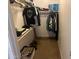 Walk-in closet with clothing racks offering storage and organization within the home's design at 14700 N El Frio St, El Mirage, AZ 85335