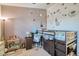 Bedroom with loft bed, desk, carpet, and whimsical planet decor at 17150 N 23Rd St # 125, Phoenix, AZ 85022