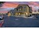 Townhome complex with garage and balcony with desert landscaping and parking at 17150 N 23Rd St # 125, Phoenix, AZ 85022